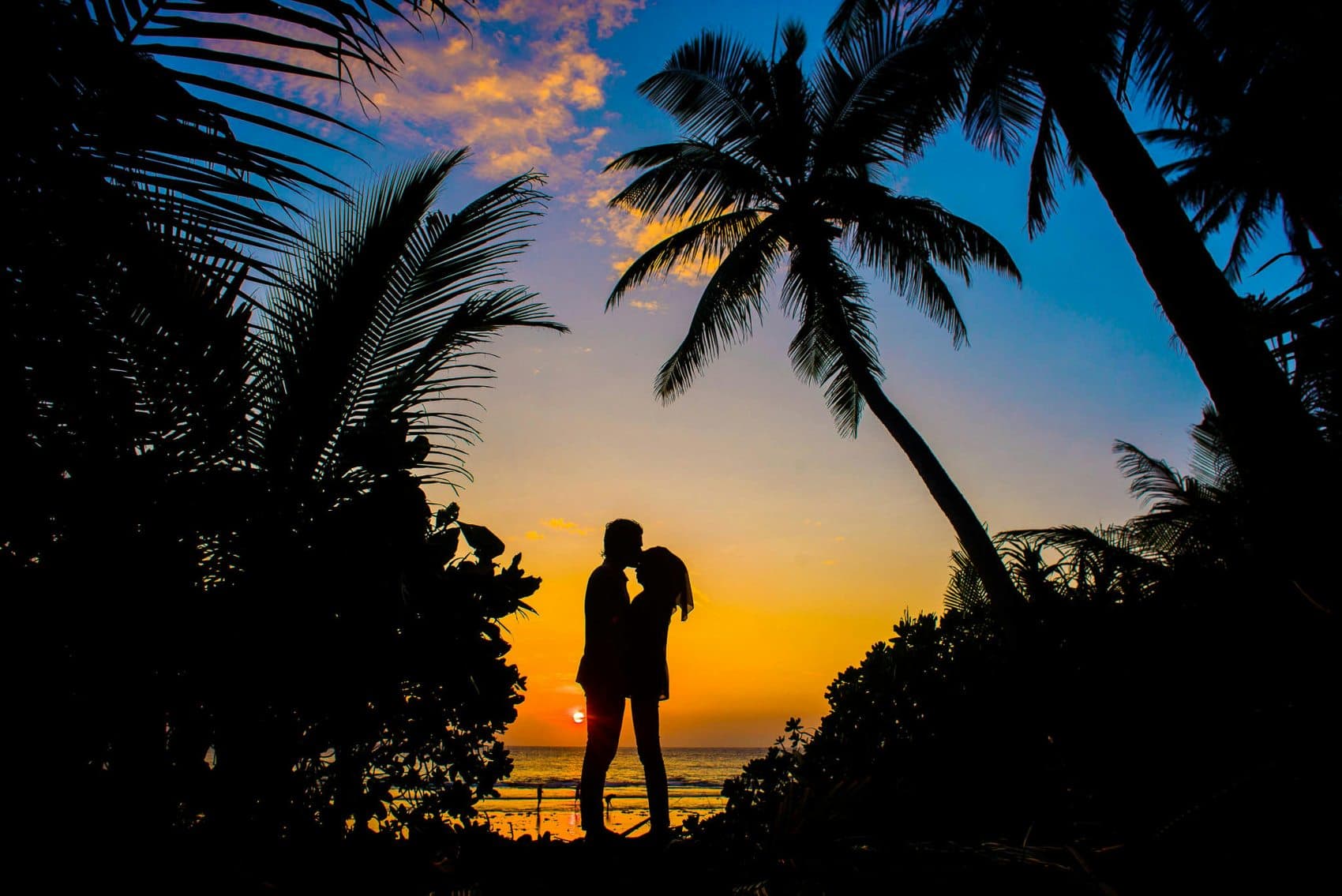 Couple embracing as the sun sets